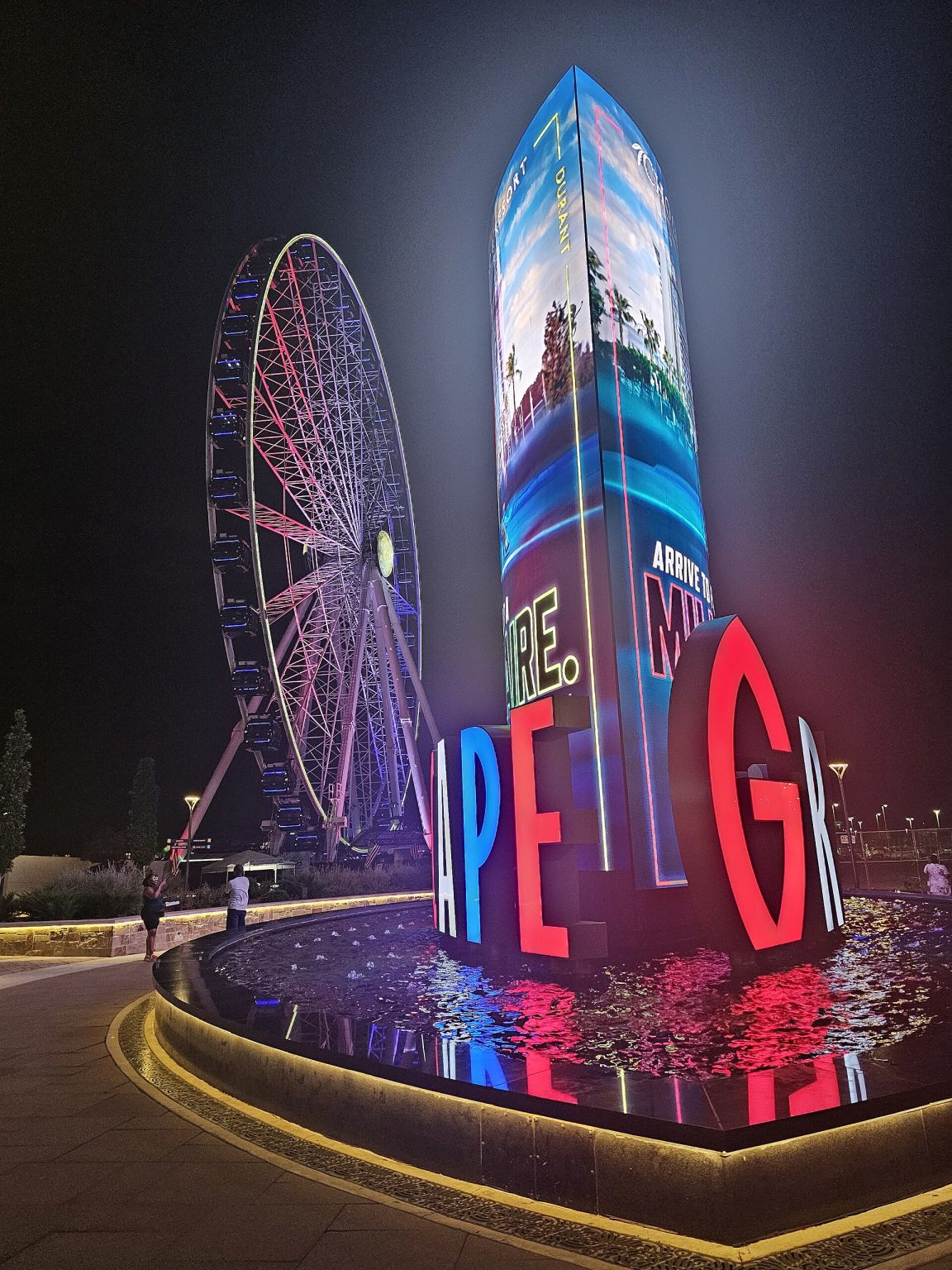 Ferris wheel at Grandscape in The Colony, Texas, at night